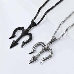 Vintage Poseidon trident necklaces in black and silver finishes on geometric stands