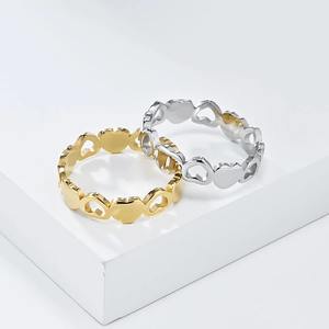 Luxurious hollow heart-shaped titanium steel rings in gold and silver finish set