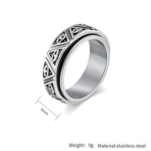 Detail view of 8mm rotating stainless steel ring with engraved Eye of Horus pattern