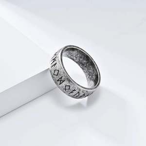 Vintage Viking Rune stainless steel ring with antique silver finish on white background