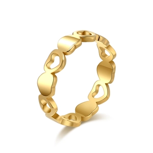 Minimalist gold heart ring featuring interlocking solid and hollow heart-shaped patterns