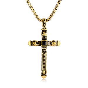 Gold gothic cross necklace with black stone and skull relief on a box chain