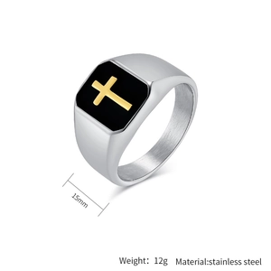 Detail view of 15mm stainless steel signet ring with black enamel and gold cross