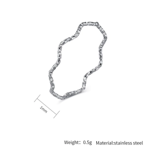 Detail view of 1mm minimalist wavy stainless steel ring with weight 0.5g specifications
