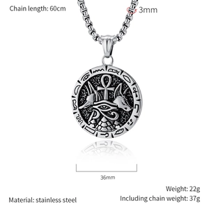 Detailed view of Anubis and Ankh cross on the round stainless steel pendant with dimensions