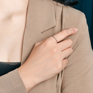 Minimalist 1mm titanium steel ring for women with textured finish on model's index finger