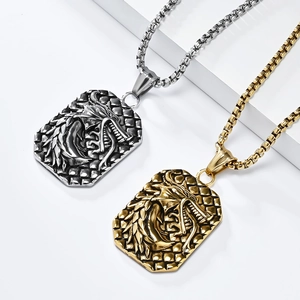 Detailed close-up of retro wolf head relief pendants in gold and silver finishes