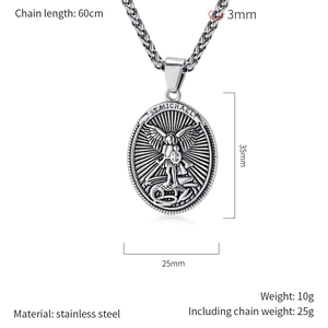 Macro detail of St. Michael shield pendant in vintage stainless steel with sizing
