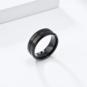 Polished 8mm black tungsten steel ring for men featuring beveled edges and central groove