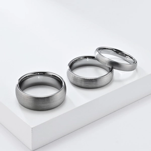 Detail view of matte brushed tungsten steel rings in three different widths for unisex style