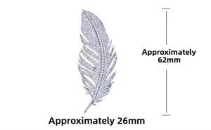 Detailed view of silver feather brooch with diamonds showing dimensions 62mm by 26mm