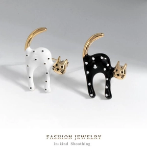 Cute black and white polka dot cat brooches with gold accents for sweaters