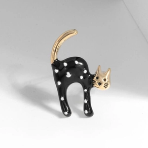 Cute black enamel cat brooch with white polka dots and gold plated metal finish