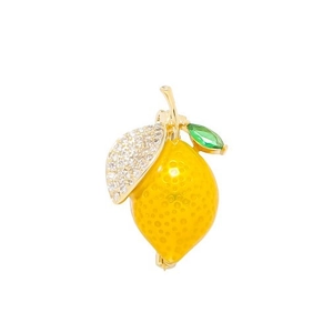 Broche citron jaune mignonne avec strass brillants et cristal vert sur monture dorée