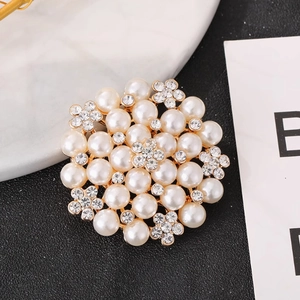 Elegant circular cluster brooch with white pearls and gold metal base for suits