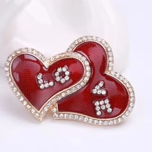 Elegant double heart brooch with red enamel and rhinestones spelling LOVE for women