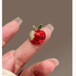 Elegant red apple brooch with sparkling crystals and gold stem leaf detail