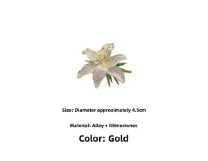 Detailed close-up of crystal lily flower brooch with green enamel leaves on gold base