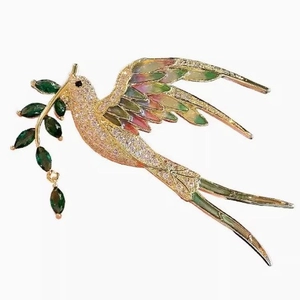 Broche hirondelle exquise avec ailes en émail coloré et détails de branche d'olivier vert