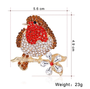 Detailed view of crystal bird brooch showing dimensions 5.6cm width and 4.9cm height
