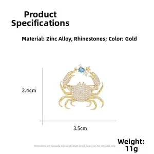 Detailed view of crab brooch dimensions made of gold-tone zinc alloy and blue rhinestone