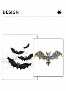 Detailed close-up of a vintage bat brooch with blue rhinestones and gothic design