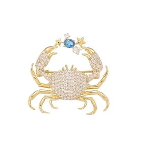 Creative crab brooch pin with gold metal, white zircons and blue oval stone centerpiece