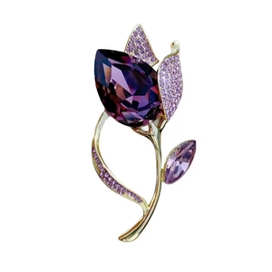 Detail of European crystal purple tulip brooch with gold plating and sparkling rhinestones