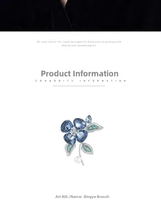 Détails de la broche orchidée avec pétales en cristal bleu et perle suspendue