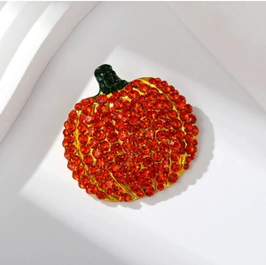 Funkelnde Kürbis-Brosche mit orangen und grünen Kristallen auf Goldfassung für Halloween