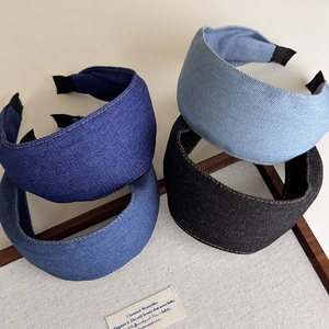 Fashionable denim headbands in four blue shades with contrasting yellow stitching