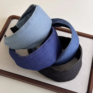 Minimalist denim headbands in assorted colors with contrast stitching and wide design