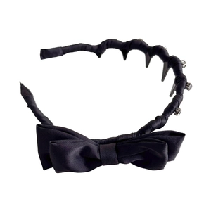 Elegant black satin wavy headband with bow and small white rhinestones for women