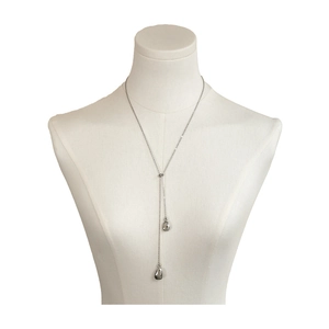 Minimalist silver teardrop Y-necklace with adjustable slide clasp on a white mannequin