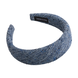 Blue tweed sponge headband with wide brim and handmade label for elegant hair styling