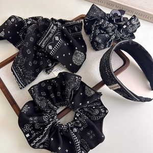 4-piece vintage black paisley hair accessories set including scrunchie, bow, and headband