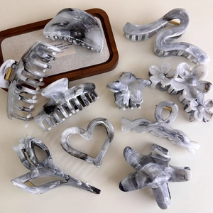 Grey marble ink pattern acetate hair claws in heart and star shapes for women