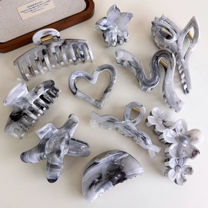 Set of 9 grey marble ink pattern hair claws in various geometric and floral shapes