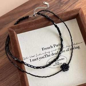 Elegant vintage double-layer black beaded necklace with rose pendant and silver clasp