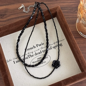 Double-layered black crystal bead necklace with vintage rose pendant and silver chain
