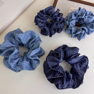 French vintage style denim polka dot scrunchies set in light and dark blue tones