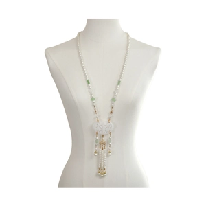 Traditional Chinese long necklace with white pearls, green beads and tassel ruyi pendant