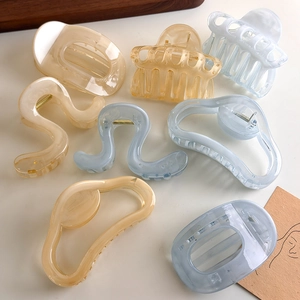 Cloud shape geometric hair claw set in blue and cream resin for versatile styling