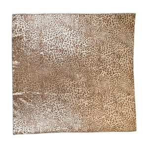 Flat lay of square leopard print silk scarf with vintage animal pattern and fine texture