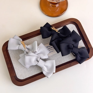 Elegant layered bow hair clip with Love letter metal charm in black and silver-grey colors