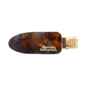 Elegant tortoiseshell acetate hair clip with golden metal accents and Barrette La France text