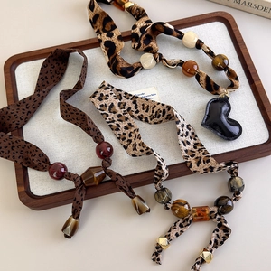 Maillard leopard print silk scarf necklace with amber resin beads and heart pendant