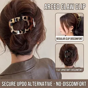 Flat leopard print and black hair claw clips with ergonomic curved design for women