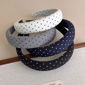 Cerchietti imbottiti a pois in quattro colori con texture in tessuto classico per donna