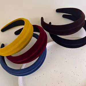Chic padded velvet headband collection in assorted colors for a high top hair look